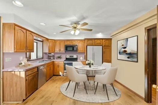 Dining room, Interior, Kitchen, Recessed Lighting, Stainless Steel Appliances, Wood Texture Flooring