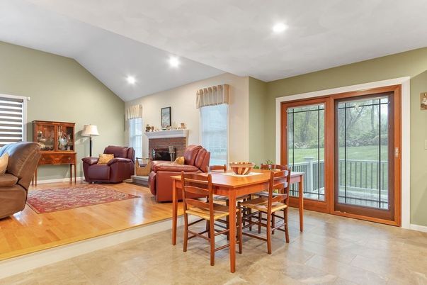 Dining room, Fireplace, Interior, Living room, Recessed Lighting, Wood Texture Flooring