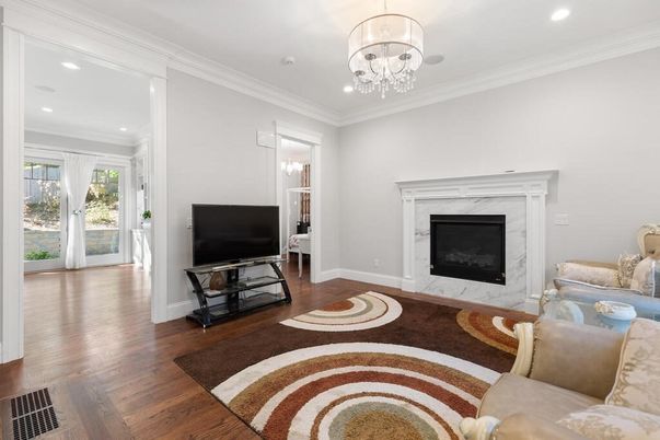 Chandelier, Fireplace, Interior, Living room, Recessed Lighting, Wood Texture Flooring