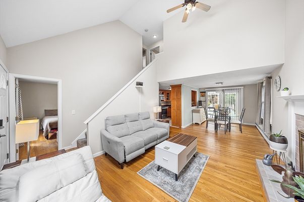 Dining room, Fireplace, Interior, Living room, Recessed Lighting, Wood Texture Flooring