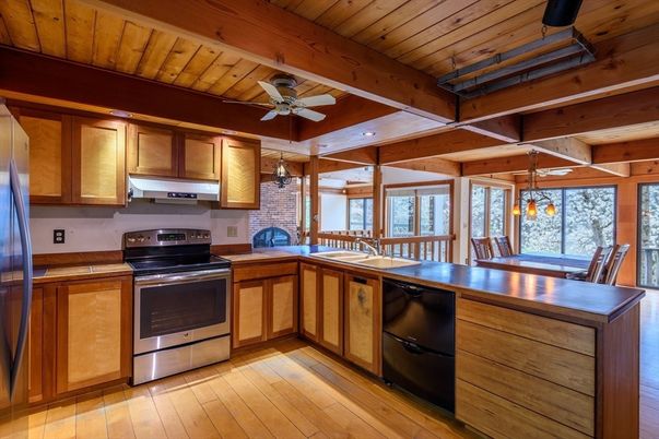 Dining room, Interior, Kitchen, Pendant Lights, Stainless Steel Appliances, Stone Walls, Wooden Beams, Wooden Ceilings, Wood Texture Flooring