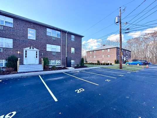 Exterior, Facade, Brick Facade, Condo Building