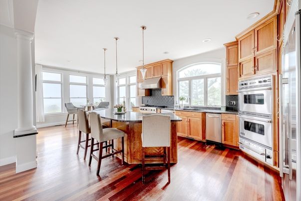 Dining room, Interior, Kitchen, Pendant Lights, Recessed Lighting, Stainless Steel Appliances, Wood Texture Flooring