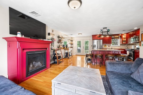 Fireplace, Interior, Kitchen, Living room, Recessed Lighting, Stainless Steel Appliances, Wood Texture Flooring