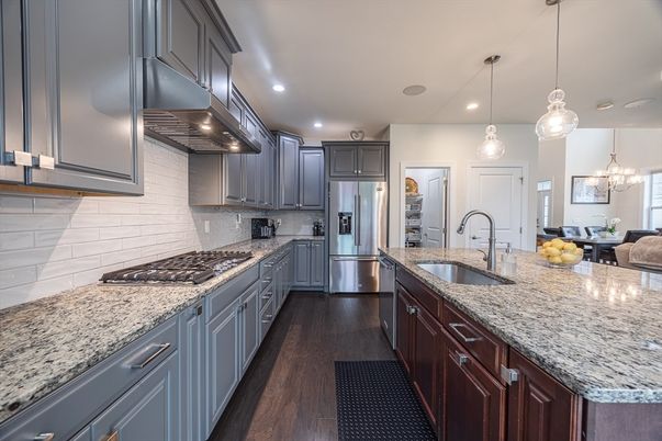 Chandelier, Dining room, Interior, Kitchen, Pendant Lights, Recessed Lighting, Stainless Steel Appliances, Wood Texture Flooring