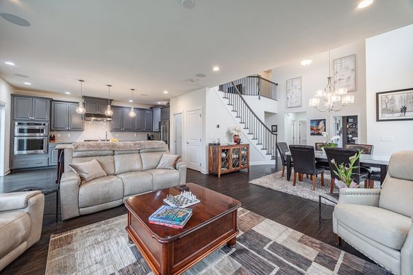 Chandelier, Dining room, Interior, Kitchen, Living room, Pendant Lights, Recessed Lighting, Stainless Steel Appliances, Wood Texture Flooring