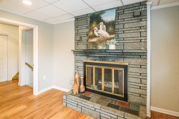 Fireplace, Interior, Recessed Lighting, Stone Walls, Wood Texture Flooring