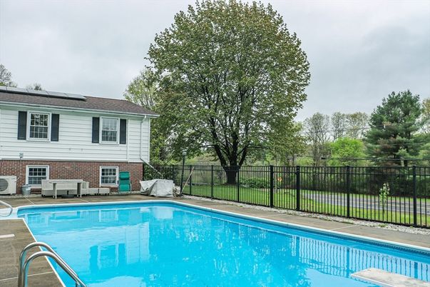 Exterior, Pool, Solar Panels