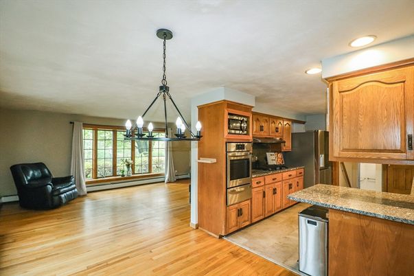 Chandelier, Interior, Kitchen, Recessed Lighting, Stainless Steel Appliances, Wood Texture Flooring