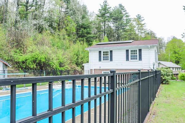 Exterior, Pool, Solar Panels