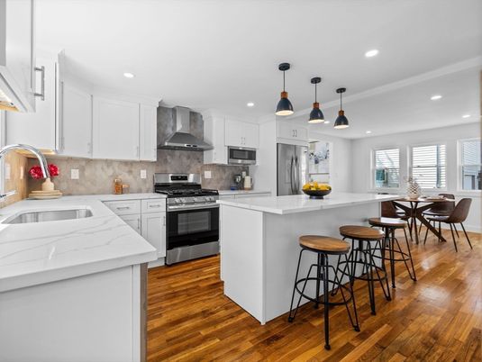 Dining room, Interior, Kitchen, Pendant Lights, Recessed Lighting, Stainless Steel Appliances, Wood Texture Flooring