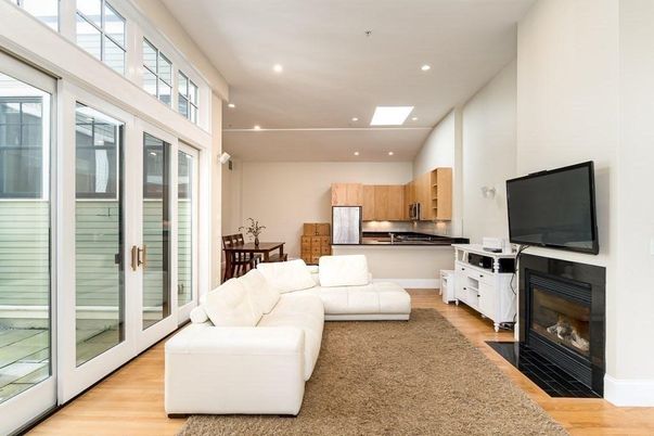 Dining room, Fireplace, Interior, Kitchen, Living room, Recessed Lighting, Stainless Steel Appliances, Wood Texture Flooring