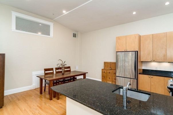 Dining room, Interior, Kitchen, Recessed Lighting, Stainless Steel Appliances, Wood Texture Flooring