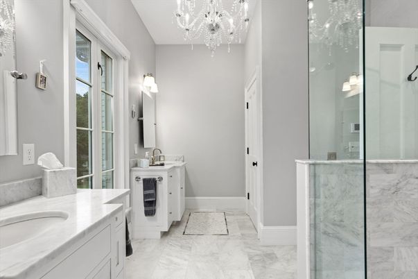 Bathroom, Chandelier, Dual Sink Vanities, Glass Shower, Interior, Marble