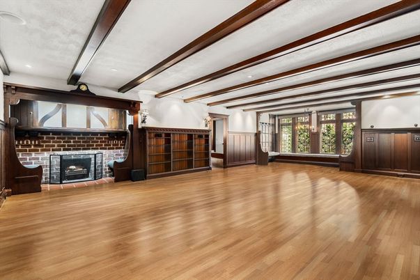 Empty room, Fireplace, Interior, Recessed Lighting, Stone Walls, Wooden Beams, Wood Texture Flooring