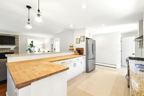 Fireplace, Interior, Kitchen, Pendant Lights, Recessed Lighting, Stone Walls