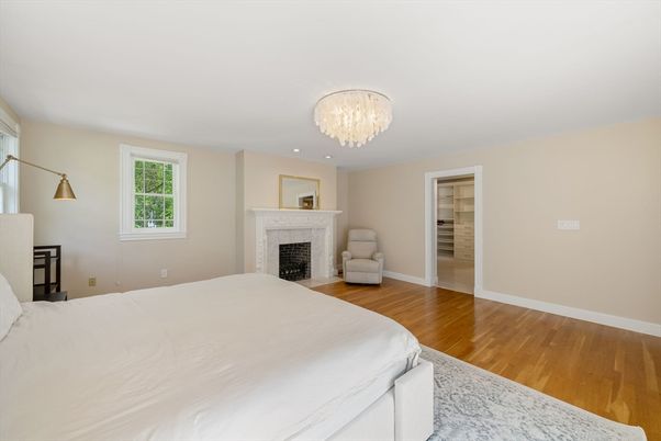 Bedroom, Chandelier, Fireplace, Interior, Wood Texture Flooring