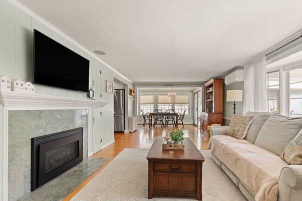 Chandelier, Dining room, Fireplace, Interior, Living room, Pendant Lights, Wood Texture Flooring