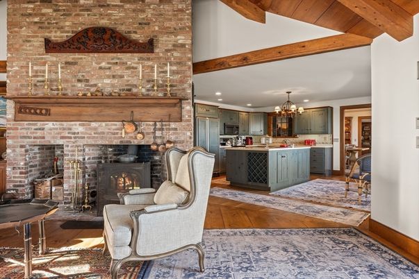 Chandelier, Fireplace, Interior, Kitchen, Recessed Lighting, Stainless Steel Appliances, Stone Walls, Wooden Beams, Wooden Ceilings, Wood Texture Flooring