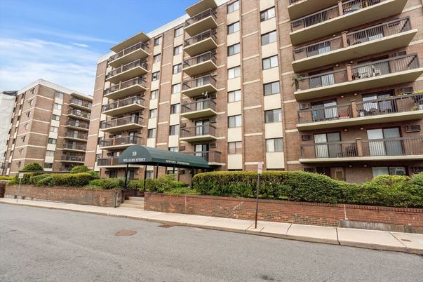 Exterior, Facade, Brick Facade, Condo Building