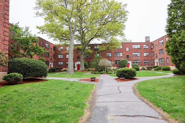Backyard, Exterior, Facade, Brick Facade, Condo Building