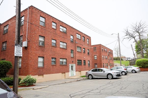 Exterior, Facade, Brick Facade, Condo Building