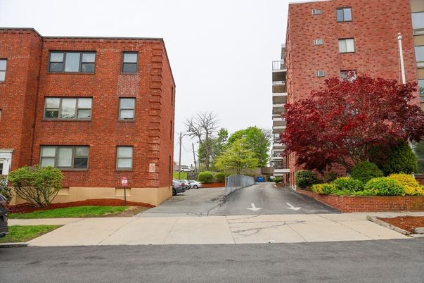 Exterior, Facade, Brick Facade, Condo Building