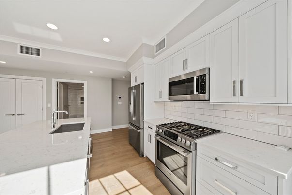 Interior, Kitchen, Recessed Lighting, Stainless Steel Appliances, Wood Texture Flooring