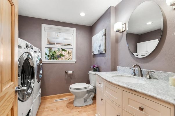 Bathroom, Interior, Recessed Lighting, Washer, Wood Texture Flooring