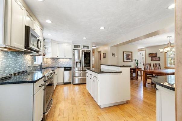 Chandelier, Dining room, Interior, Kitchen, Recessed Lighting, Stainless Steel Appliances, Wood Texture Flooring