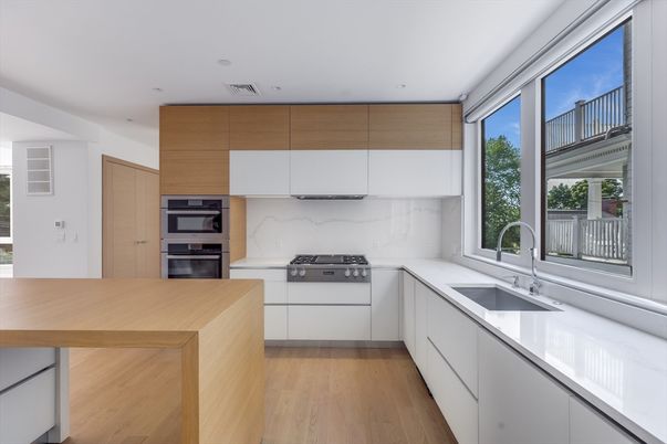 Interior, Kitchen, Marble Walls, Recessed Lighting, Stainless Steel Appliances, Wood Texture Flooring