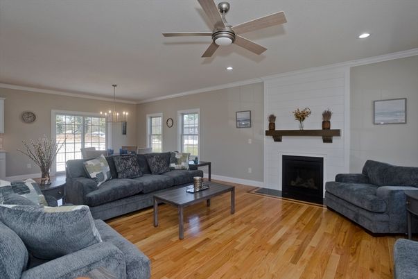 Dining room, Fireplace, Interior, Living room, Pendant Lights, Recessed Lighting, Wood Texture Flooring