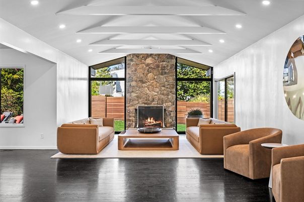 Fireplace, Interior, Living room, Recessed Lighting, Stone Walls, Wood Texture Flooring