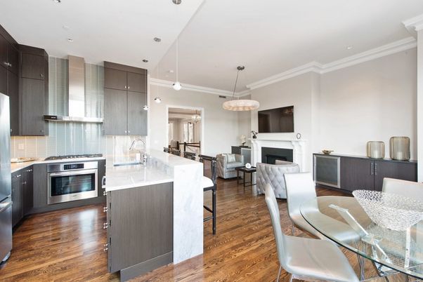 Dining room, Fireplace, Interior, Kitchen, Living room, Pendant Lights, Recessed Lighting, Stainless Steel Appliances, Wood Texture Flooring