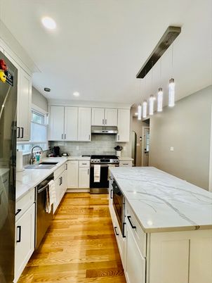 Interior, Kitchen, Pendant Lights, Recessed Lighting, Stainless Steel Appliances, Wood Texture Flooring