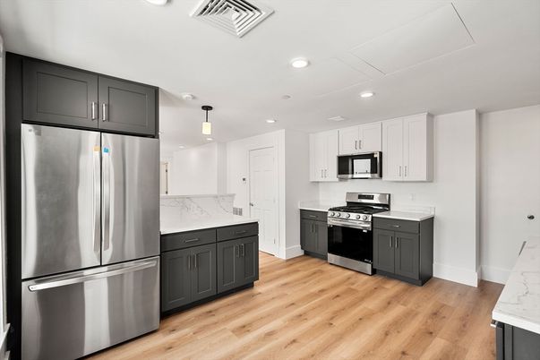 Interior, Kitchen, Pendant Lights, Recessed Lighting, Stainless Steel Appliances, Wood Texture Flooring