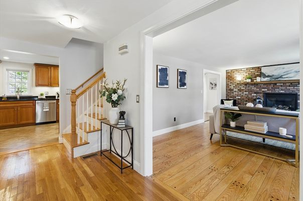 Fireplace, Interior, Kitchen, Stainless Steel Appliances, Stone Walls, Wood Texture Flooring