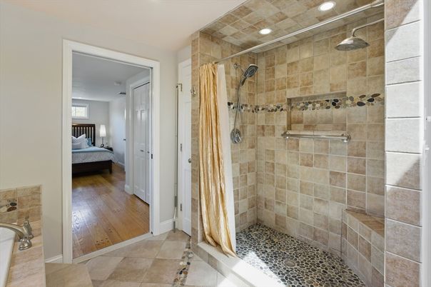 Bathroom, Bedroom, Glass Shower, Interior, Recessed Lighting, Stone Walls, Wood Texture Flooring
