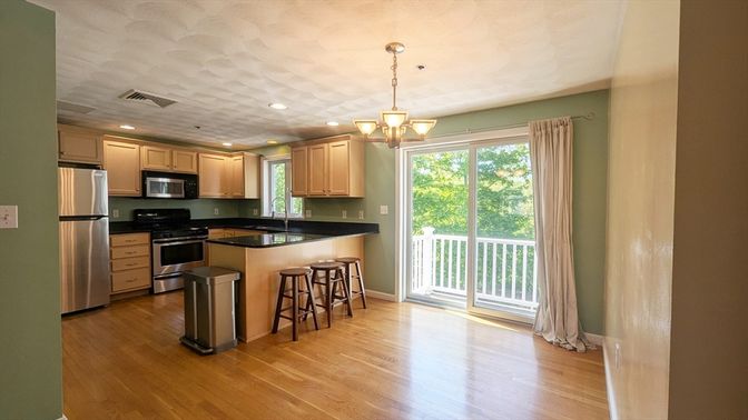 Chandelier, Interior, Kitchen, Pendant Lights, Recessed Lighting, Stainless Steel Appliances, Wood Texture Flooring