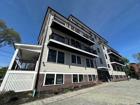 Exterior, Facade, Brick Facade, Condo Building