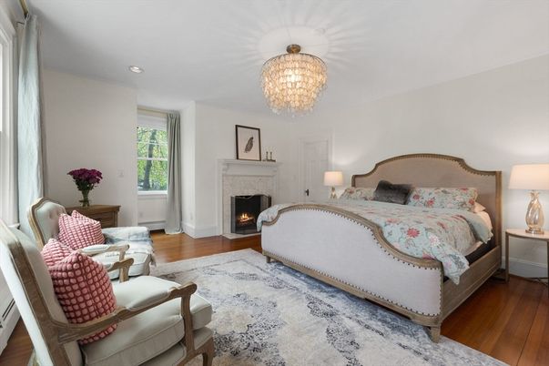 Bedroom, Chandelier, Fireplace, Interior, Recessed Lighting, Wood Texture Flooring