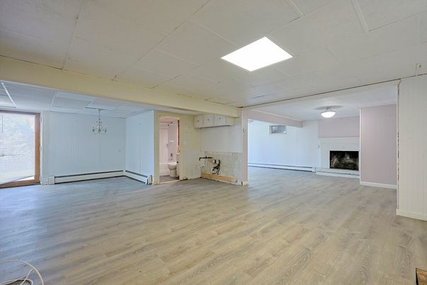Empty room, Fireplace, Interior, Recessed Lighting, Wood Texture Flooring