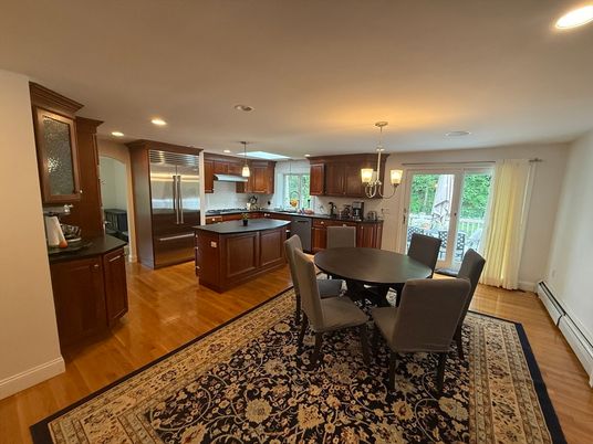Chandelier, Dining room, Interior, Kitchen, Pendant Lights, Recessed Lighting, Stainless Steel Appliances, Wood Texture Flooring