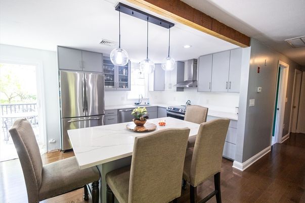 Dining room, Interior, Kitchen, Pendant Lights, Recessed Lighting, Stainless Steel Appliances, Wood Texture Flooring