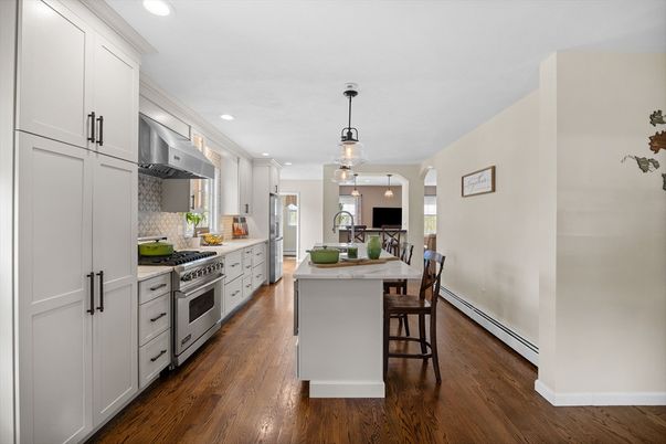 Dining room, Interior, Kitchen, Pendant Lights, Recessed Lighting, Stainless Steel Appliances, Wood Texture Flooring