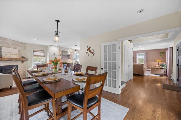 Dining room, Fireplace, Interior, Kitchen, Living room, Pendant Lights, Recessed Lighting, Stone Walls, Wood Texture Flooring
