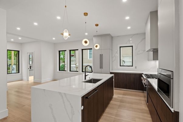 Interior, Kitchen, Marble Walls, Pendant Lights, Recessed Lighting, Stainless Steel Appliances, Wood Texture Flooring