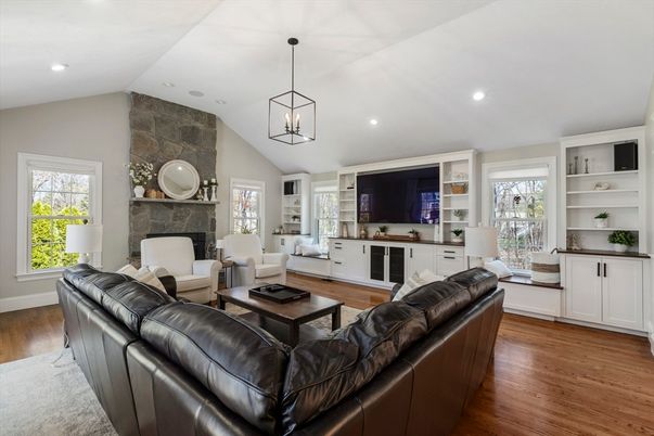 Fireplace, Interior, Living room, Pendant Lights, Recessed Lighting, Stone Walls, Wood Texture Flooring