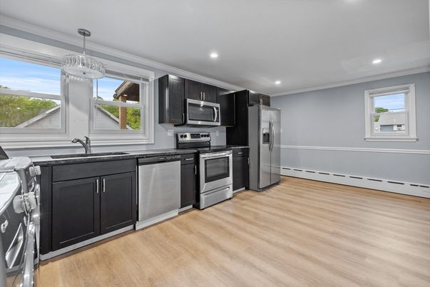 Interior, Kitchen, Pendant Lights, Recessed Lighting, Stainless Steel Appliances, Wood Texture Flooring