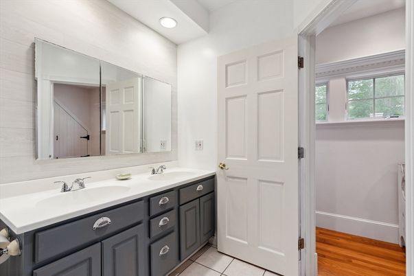 Bathroom, Dual Sink Vanities, Interior, Recessed Lighting, Wood Texture Flooring
